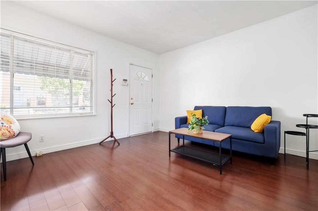 4088 Howley Street Pittsburgh, PA 15224 - Photo 4 of 32 a living room with furniture and a table