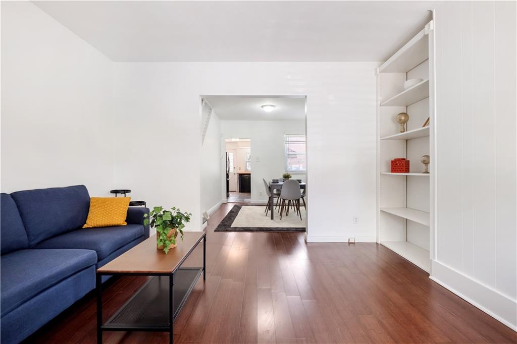 4088 Howley Street Pittsburgh, PA 15224 - Photo 5 of 32 a living room with furniture and a wooden floor