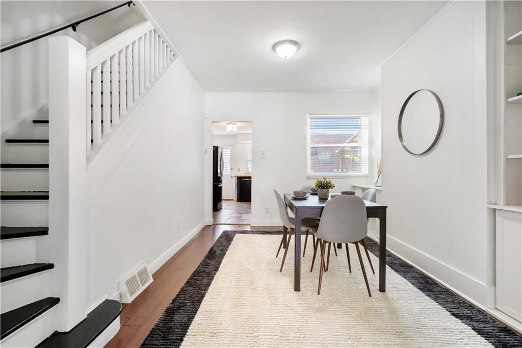 4088 Howley Street Pittsburgh, PA 15224 - Photo 7 of 32 a view of a dining room with furniture window and wooden floor