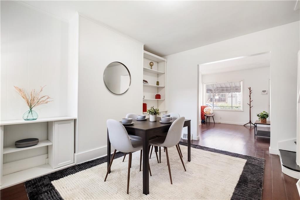 4088 Howley Street Pittsburgh, PA 15224 - Photo 8 of 32 a dining room with furniture and wooden floor