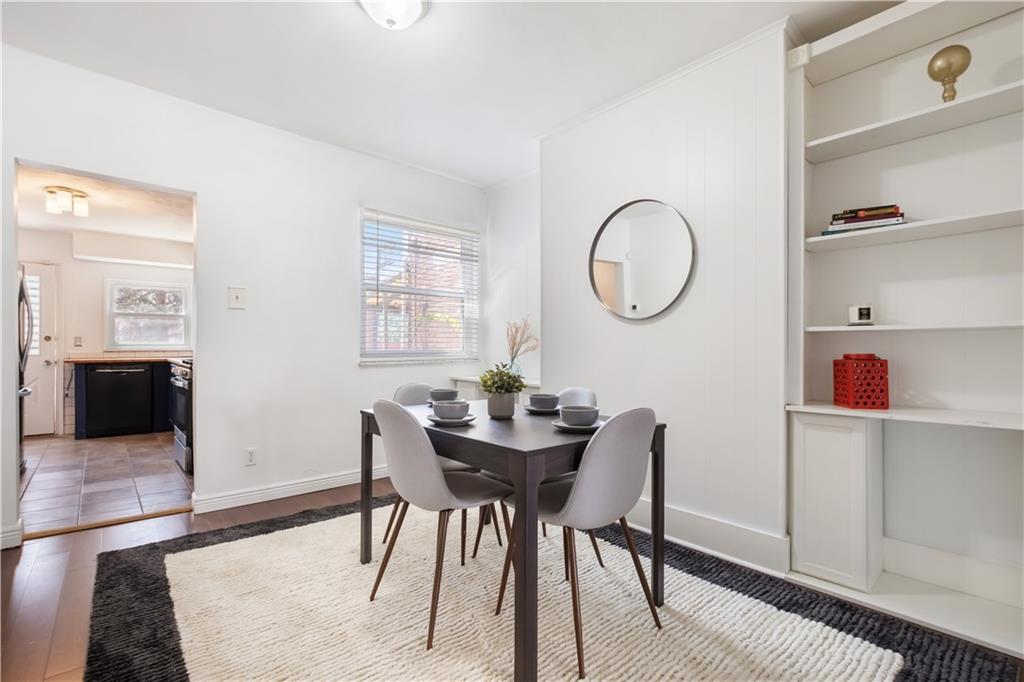 4088 Howley Street Pittsburgh, PA 15224 - Photo 9 of 32 a dining room with furniture and wooden floor