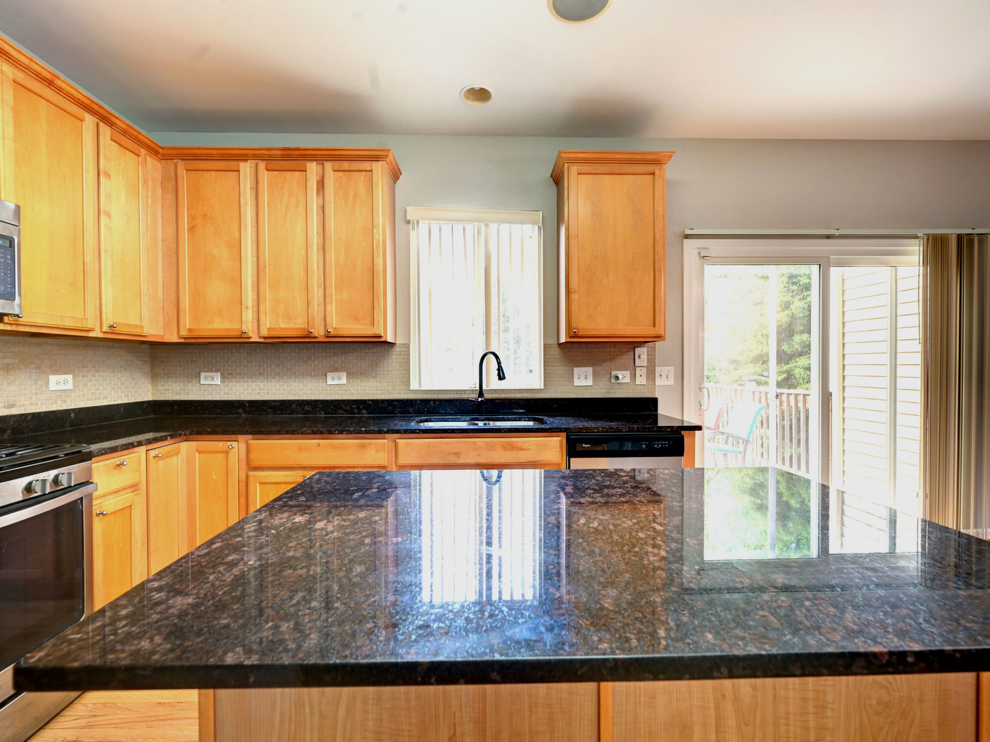 6 Forsythia Court Bolingbrook, IL 60490 - Photo 13 of 28 a kitchen with a window a sink and a counter space