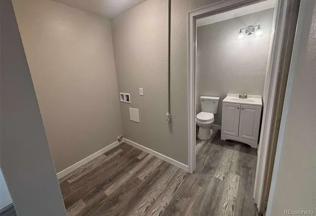 a view of a room with a washer and dryer