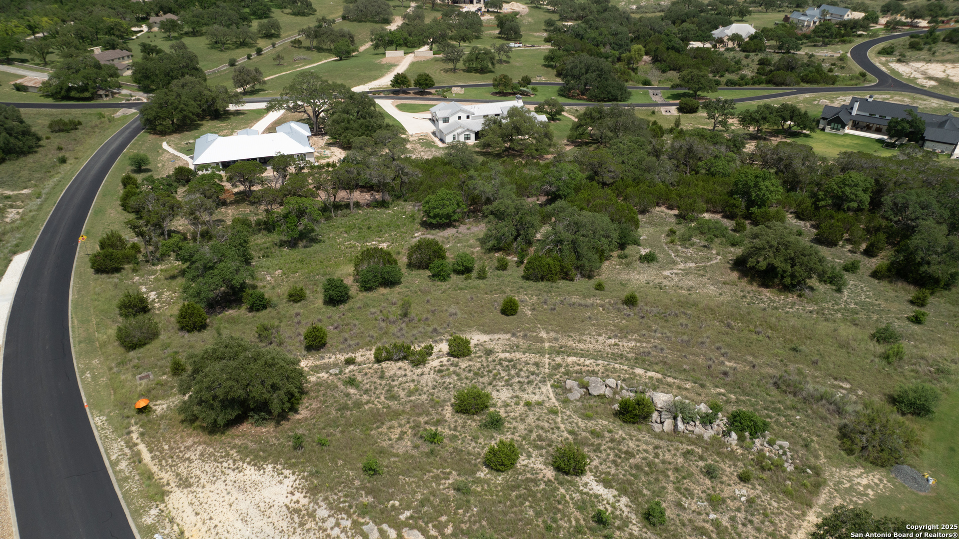 161 Puzzle Pass Spring Branch, TX 78070 - Photo 11 of 18 an aerial view of a house with a yard