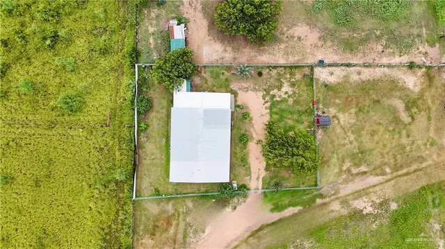 a view of a garden with a small pool