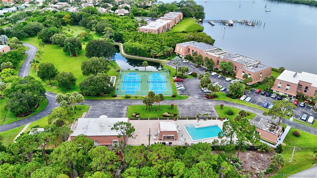 3100 Southeast Pruitt Road, Unit B105 Port St. Lucie, FL 34952 - Photo 23 of 40 an aerial view of a house with a garden