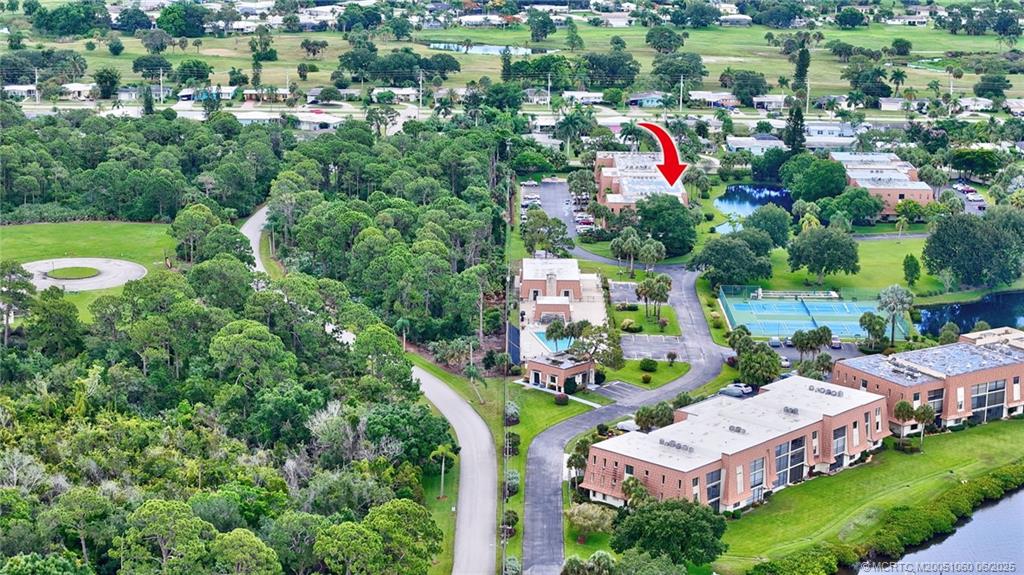 3100 Southeast Pruitt Road, Unit B105 Port St. Lucie, FL 34952 - Photo 28 of 40 an aerial view of multiple house