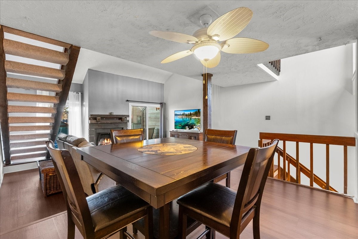 671 Davis Road League City, TX 77573 - Photo 13 of 38 a view of a dining room with furniture and wooden floor