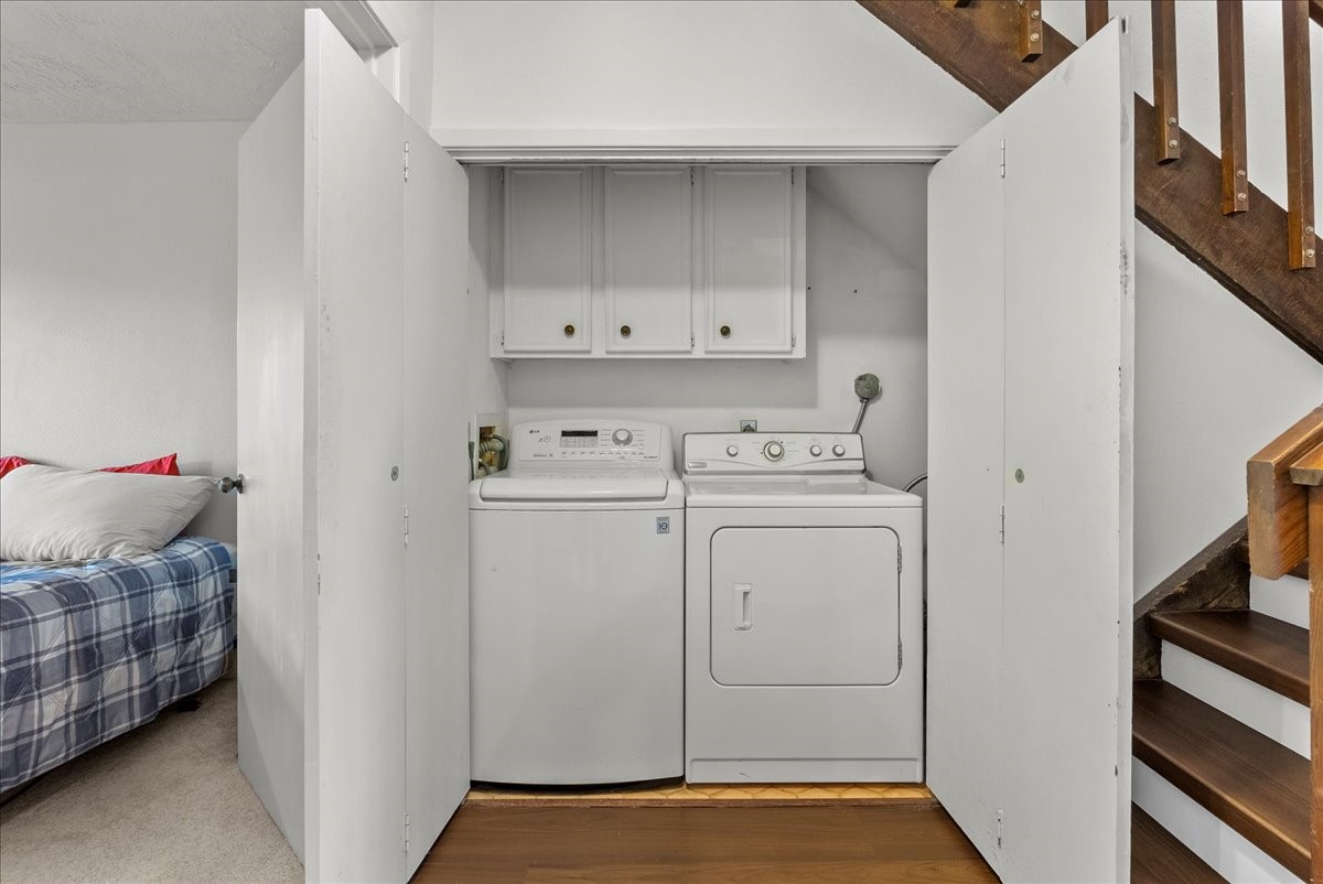 671 Davis Road League City, TX 77573 - Photo 23 of 38 a utility room with dryer and washer