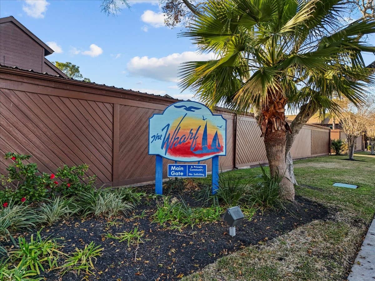 671 Davis Road League City, TX 77573 - Photo 29 of 38 a sign that is sitting in front of a house with a garden