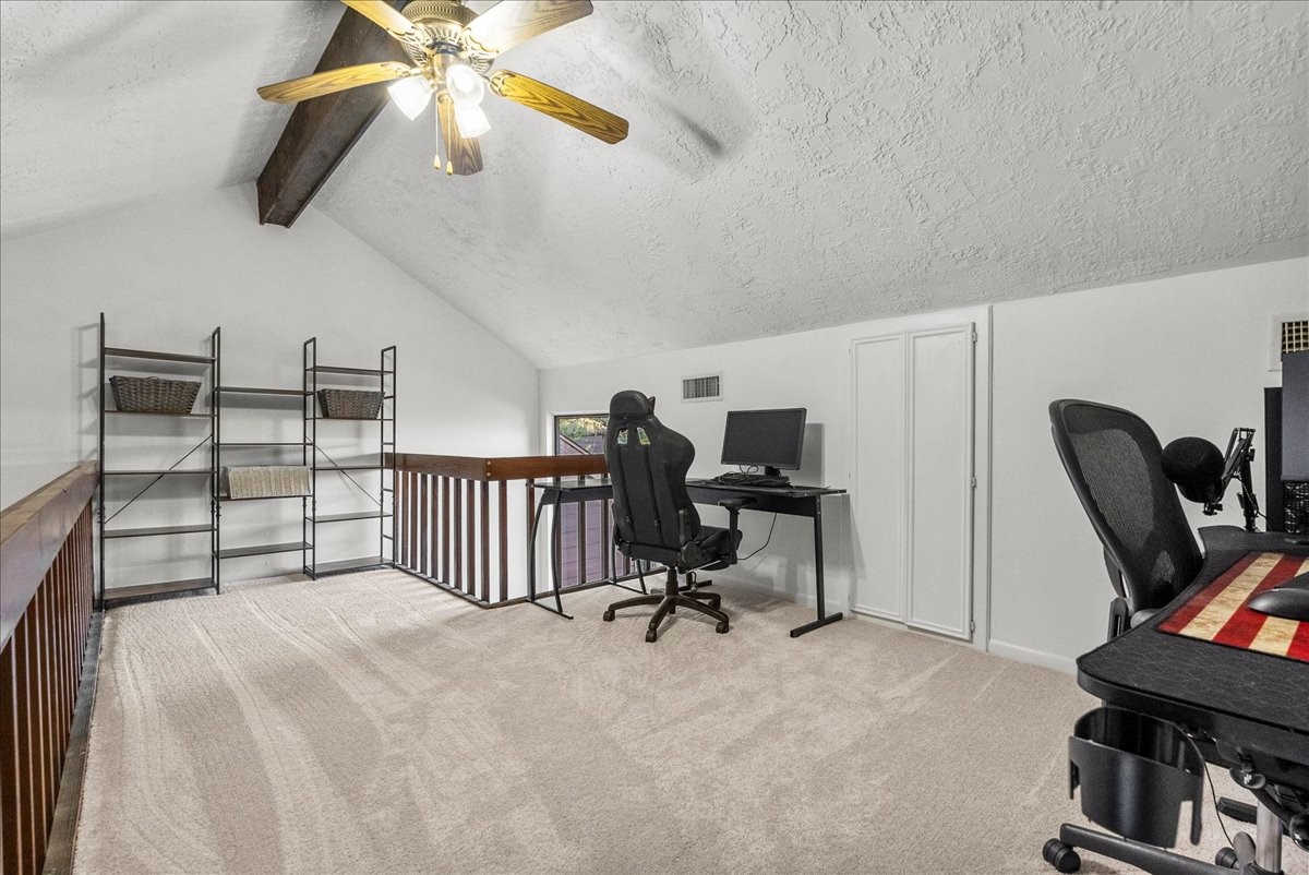 671 Davis Road League City, TX 77573 - Photo 10 of 38 a view of a workspace with furniture and a window