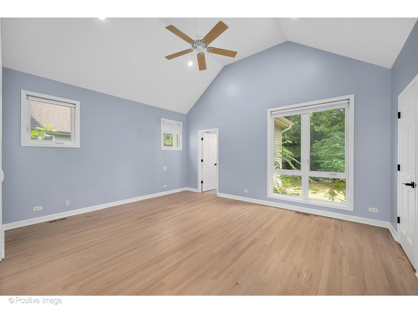 1103 Compass Court Naperville, IL 60540 - Photo 10 of 19 an empty room with wooden floor and windows