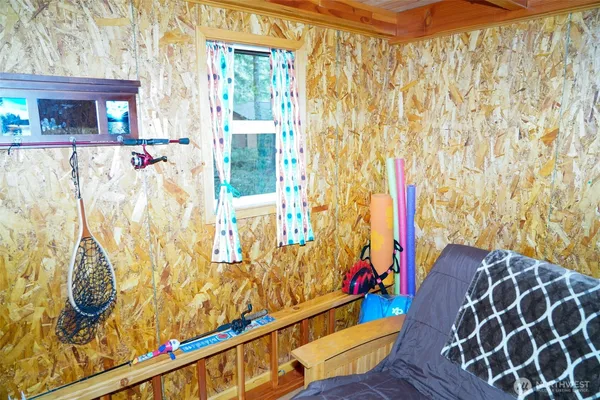 a view of wooden floor and a potted plant