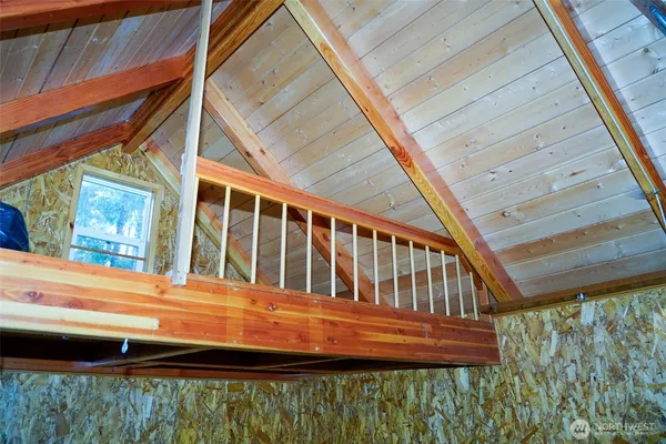 a view of balcony with a small yard