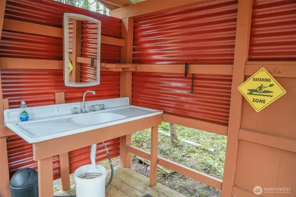 a bathroom with a sink and a vanity