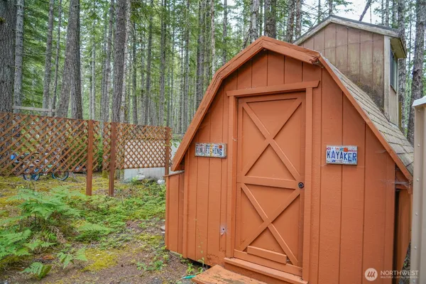 a backyard of a house with seating space