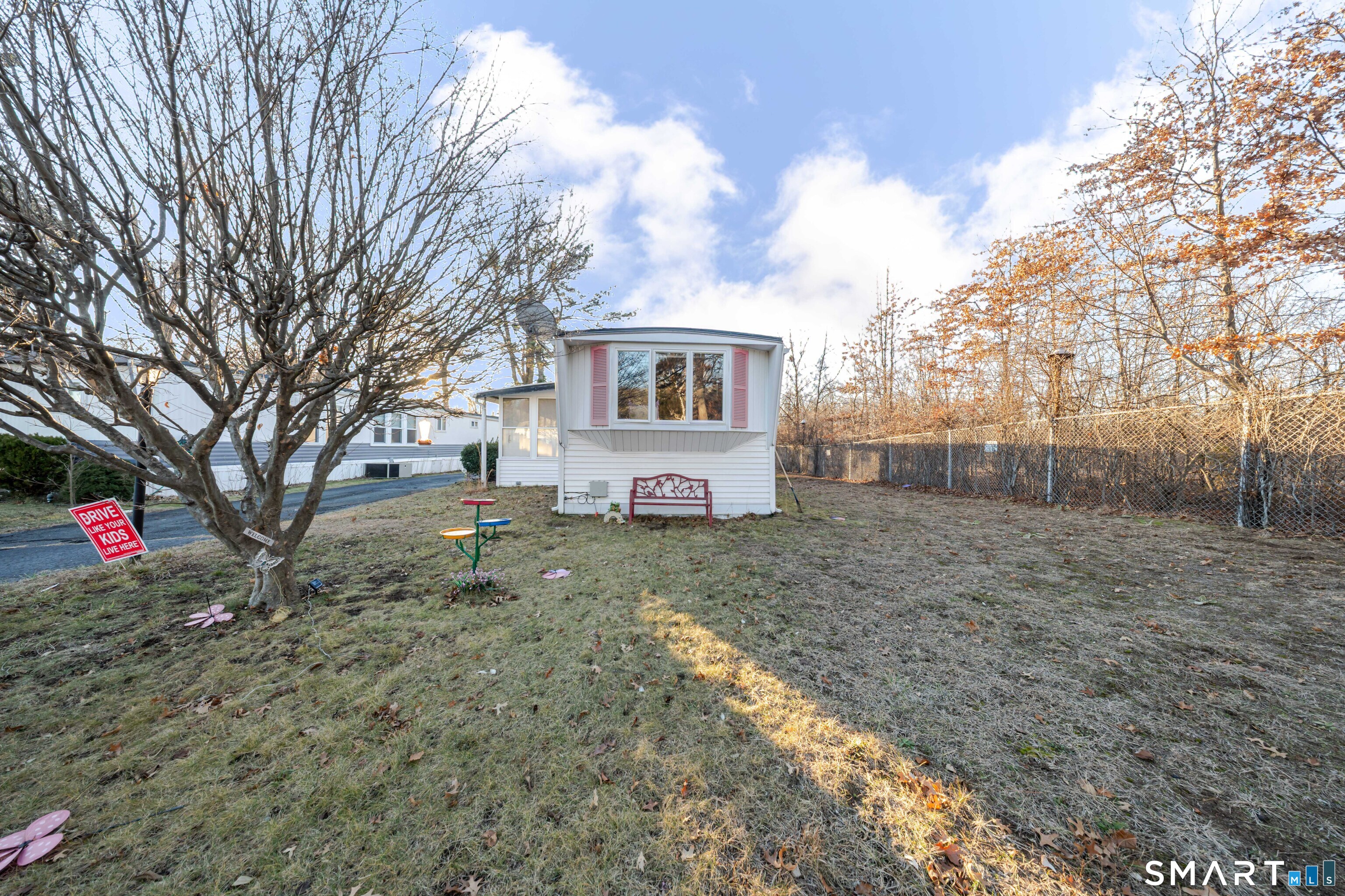 93 Shawnee Road East Hartford, CT 06118 - Photo 22 of 37 a view of a house with a yard