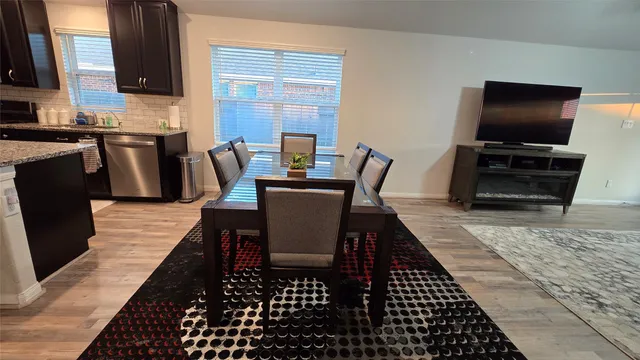 a view of a dining room with furniture