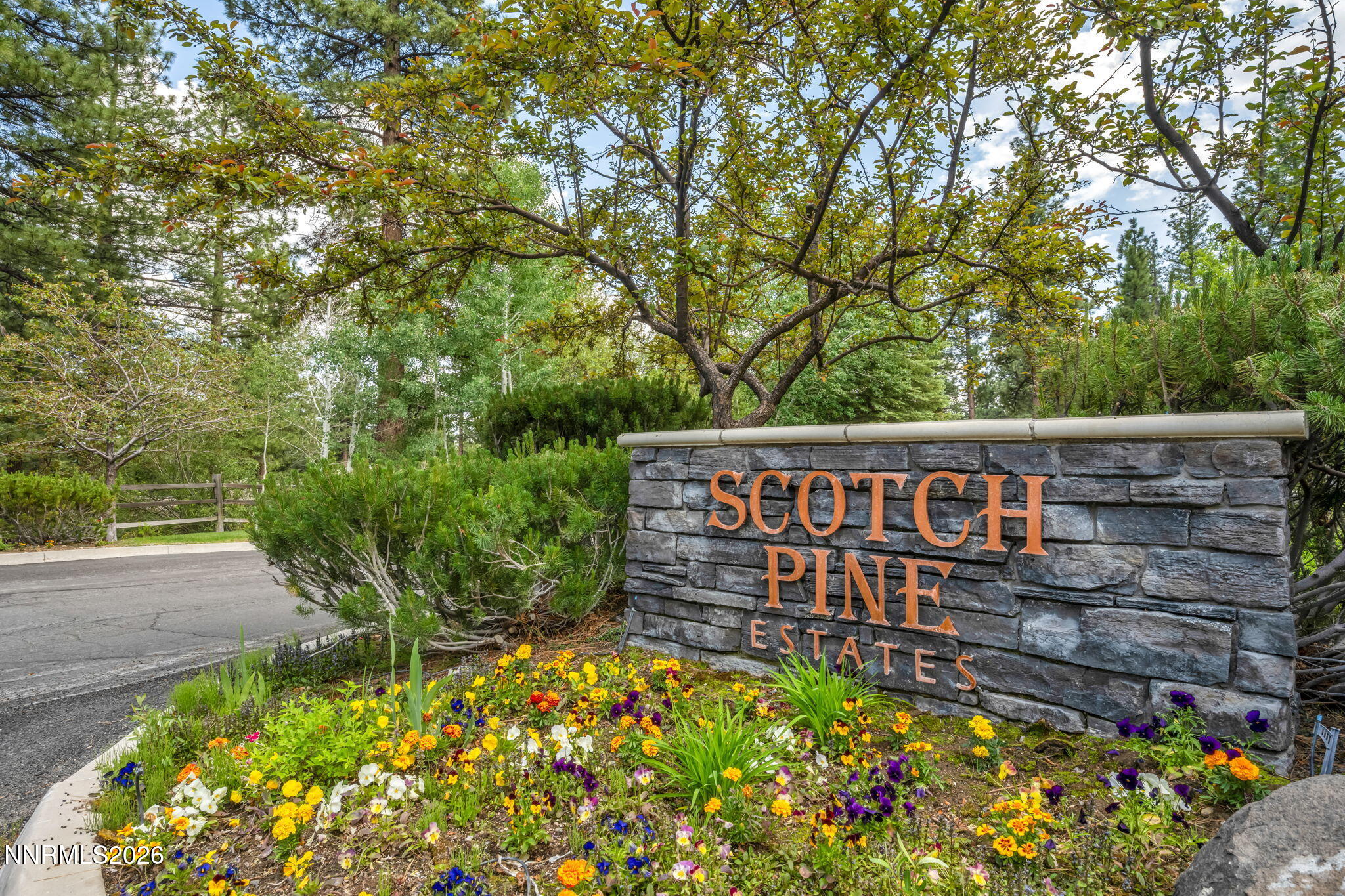 307 East Jeffrey Pine Road Reno, NV 89511 - Photo 1 of 22 a wooden sign board