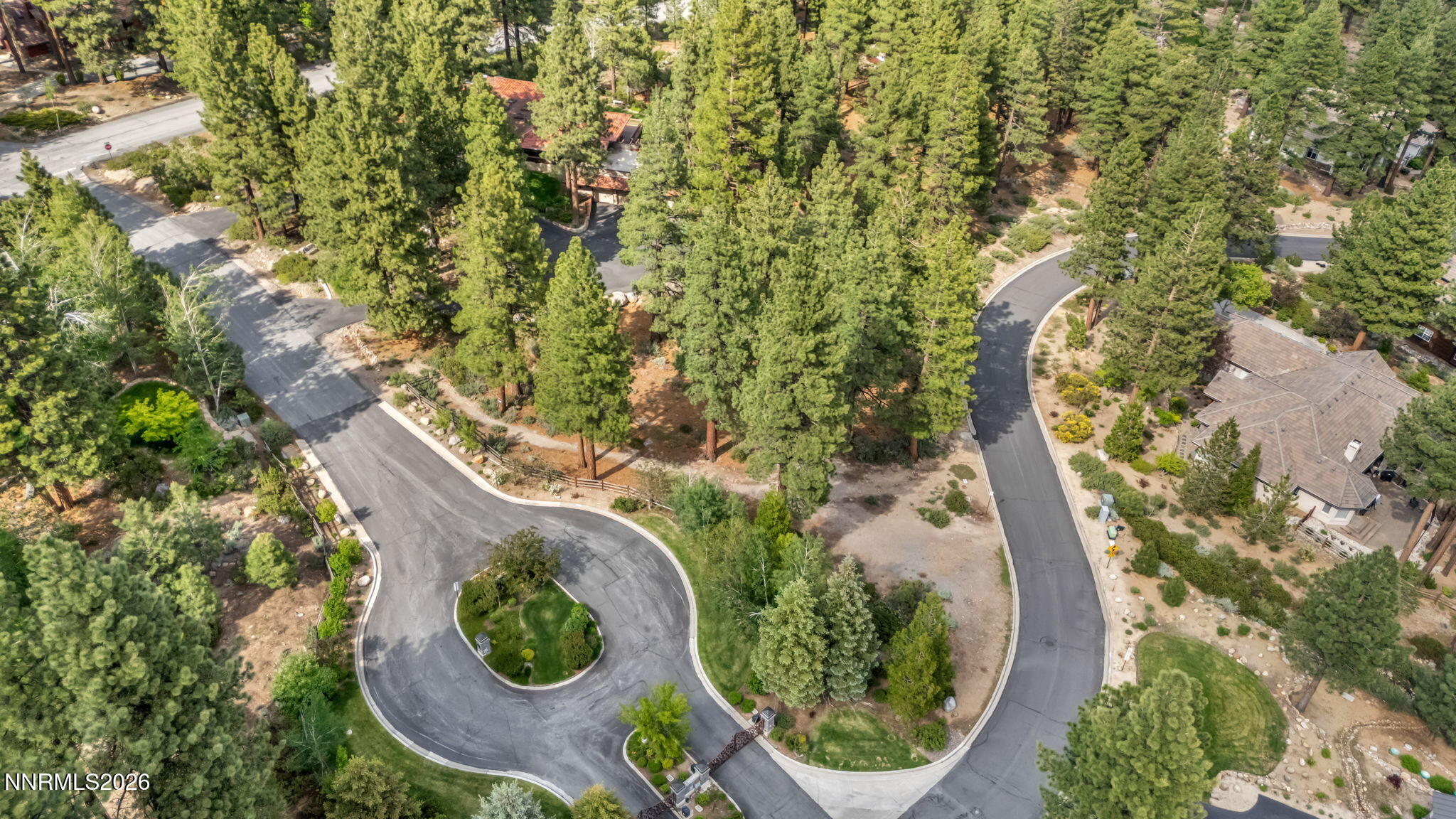 307 East Jeffrey Pine Road Reno, NV 89511 - Photo 22 of 22 an aerial view of a house with a yard and lake view