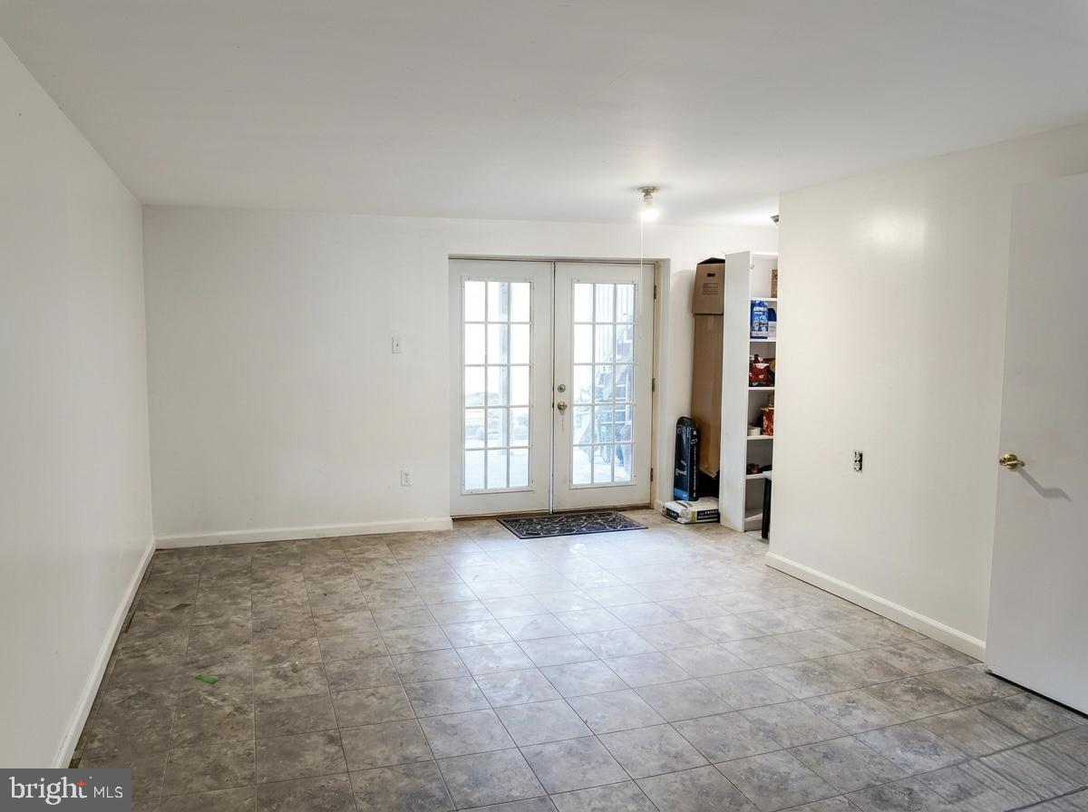 16 Powhurst Court Baltimore, MD 21236 - Photo 16 of 22 an empty room with windows