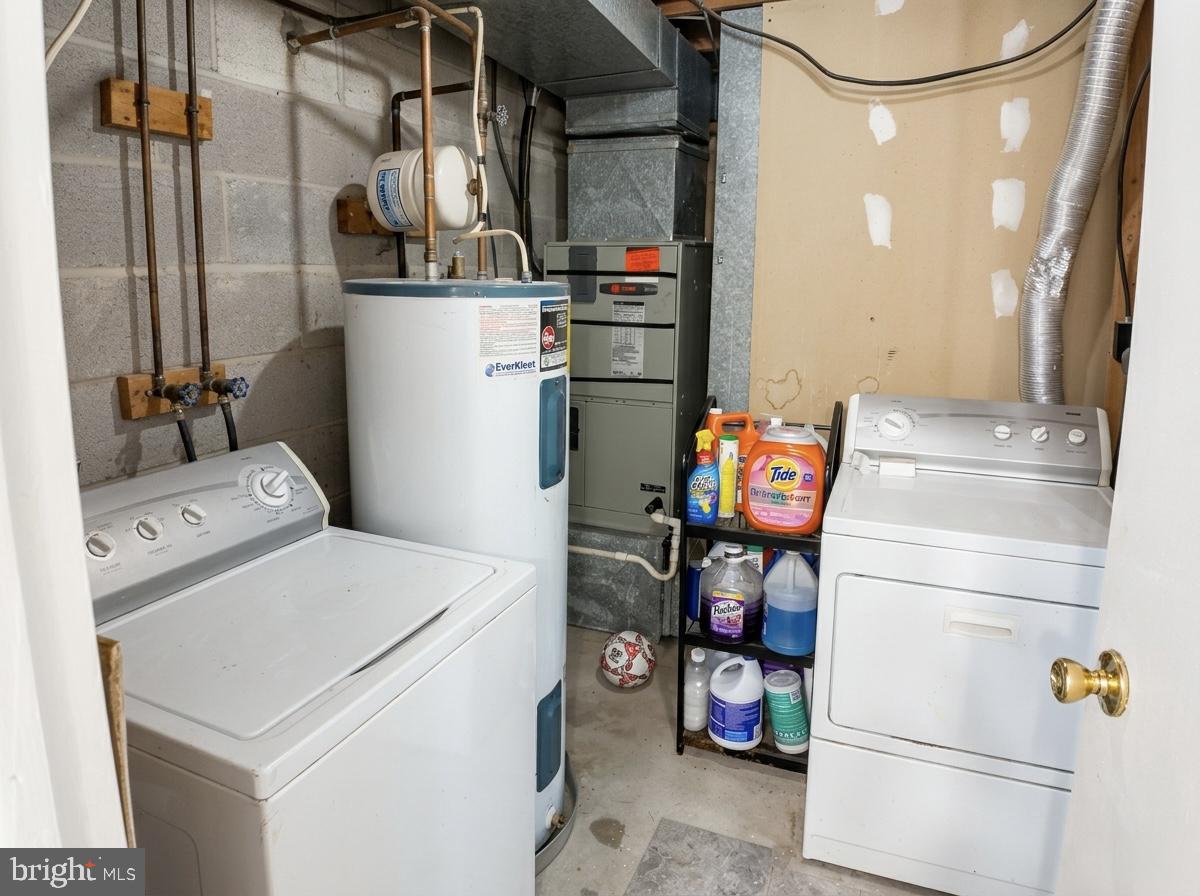 16 Powhurst Court Baltimore, MD 21236 - Photo 20 of 22 a utility room with dryer and washer
