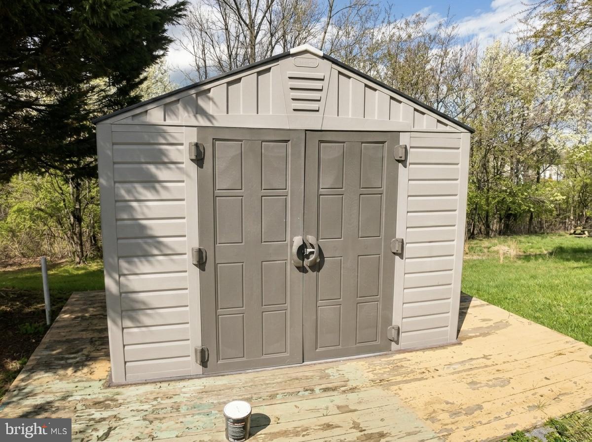 16 Powhurst Court Baltimore, MD 21236 - Photo 21 of 22 a front view of a house with a garden