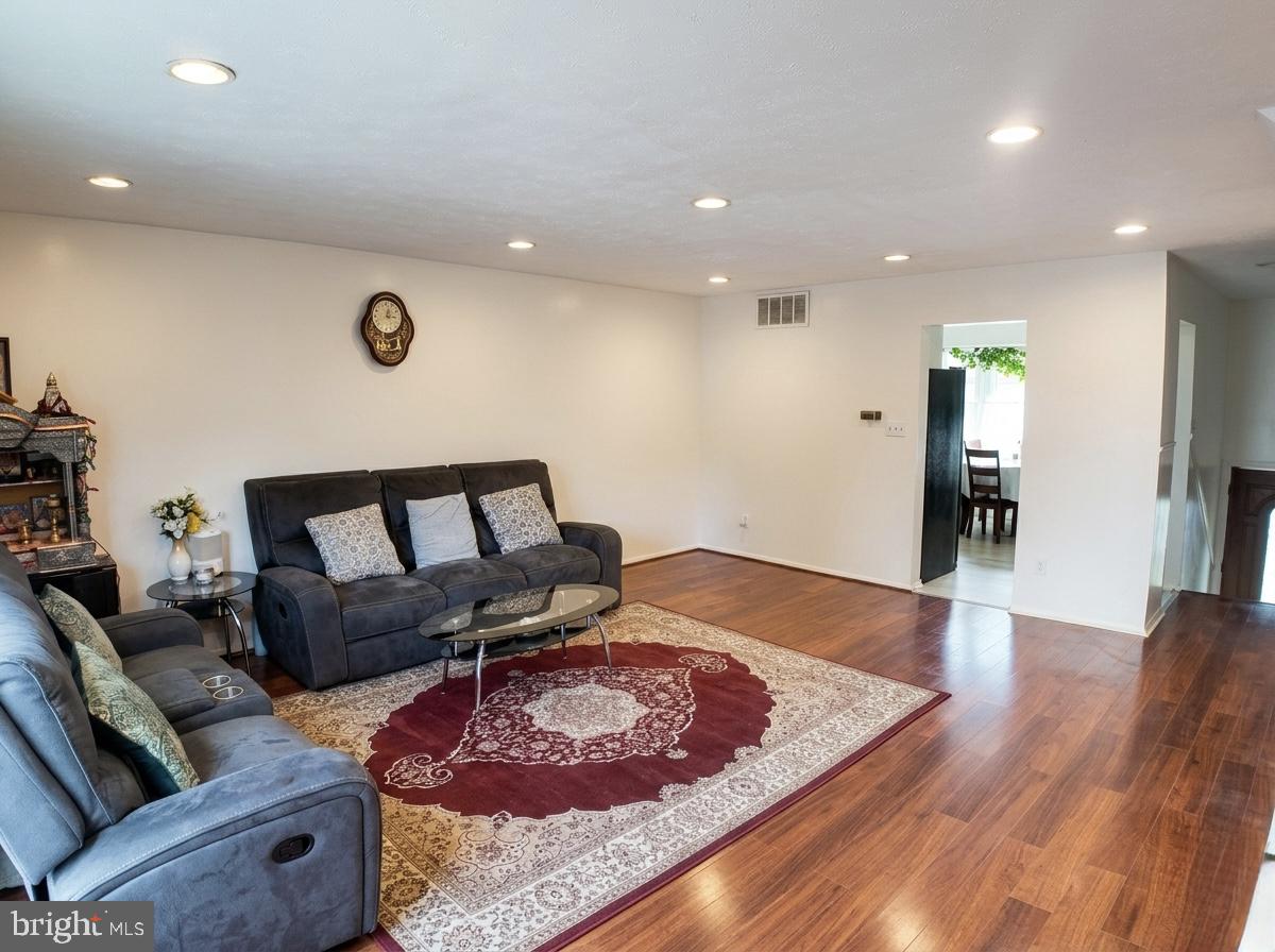 16 Powhurst Court Baltimore, MD 21236 - Photo 4 of 22 a living room with furniture and wooden floor