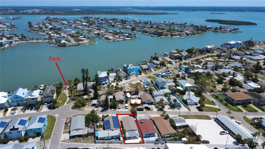 13440 1st Street East Madeira Beach, FL 33708 - Photo 3 of 44 an aerial view of a city