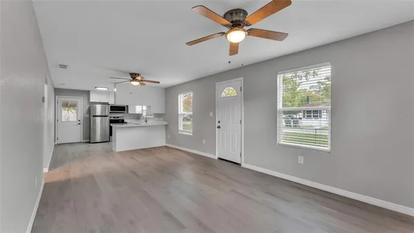 a view of a kitchen with a dishwasher cabinets and a kitchen