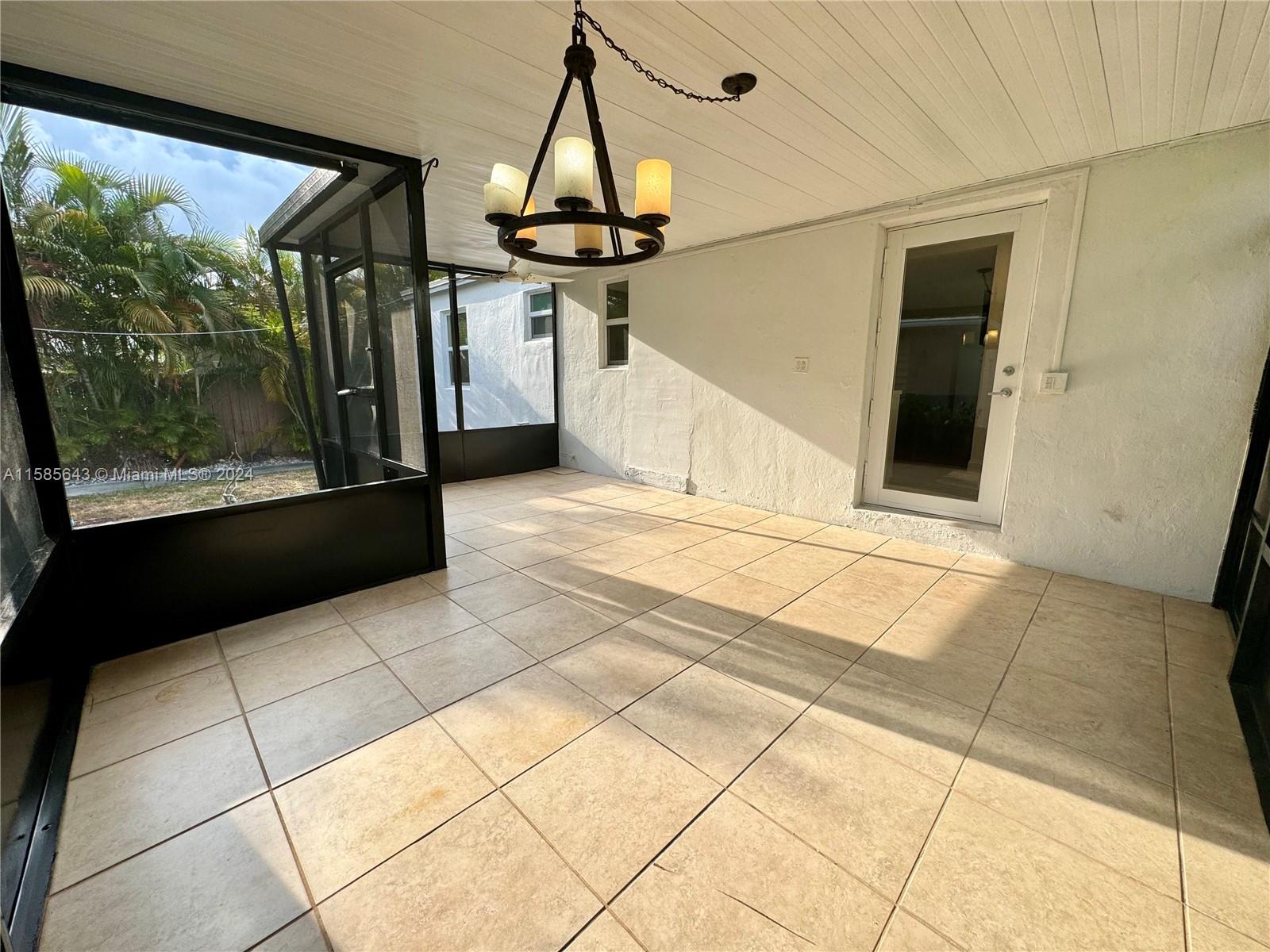 4235 Southwest 14th Street Miami, FL 33134 - Photo 29 of 32 a view of entryway with a front door
