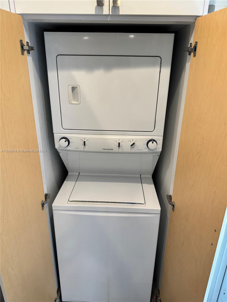 4235 Southwest 14th Street Miami, FL 33134 - Photo 4 of 32 a utility room with dryer and washer