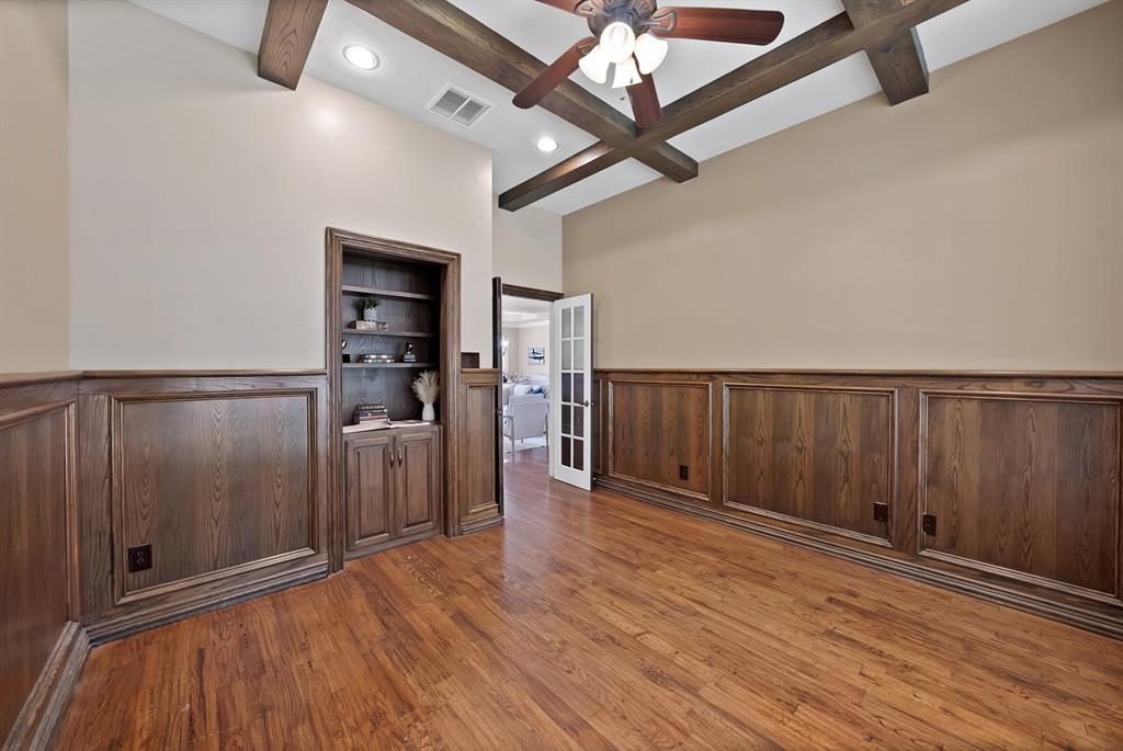 1110 McCampbell Road Mansfield, TX 76063 - Photo 12 of 39 a view of an empty room with wooden floor