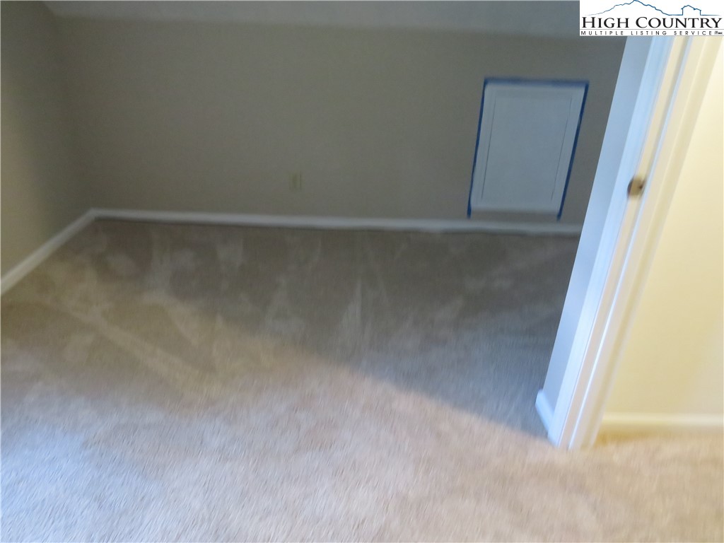 296 Silo Road Sparta, NC 28675 - Photo 20 of 24 a view of a hallway