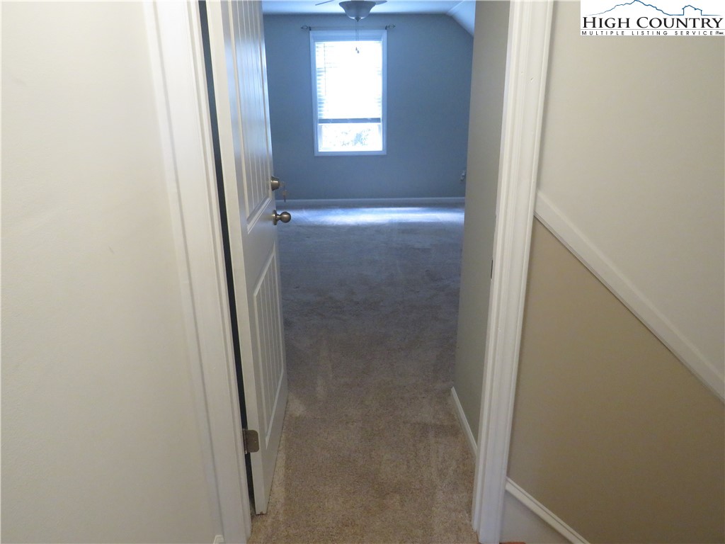 296 Silo Road Sparta, NC 28675 - Photo 21 of 24 a bathroom with a window