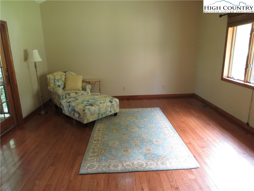 296 Silo Road Sparta, NC 28675 - Photo 6 of 24 view of living room with furniture and window