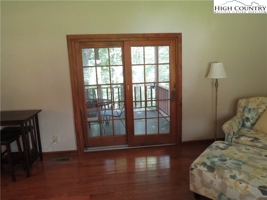 296 Silo Road Sparta, NC 28675 - Photo 8 of 24 a bedroom with a bed and a window