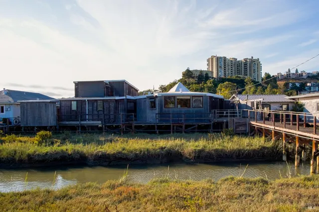 a view of a lake with a house