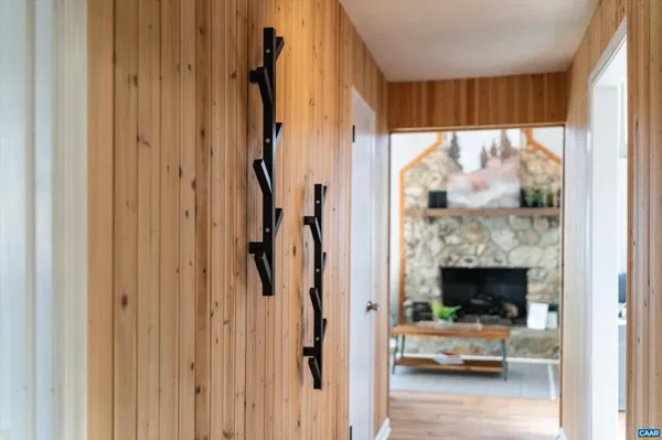 a view of living room with furniture and window