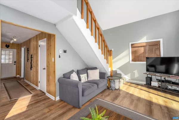 a bedroom with a bed and lamp