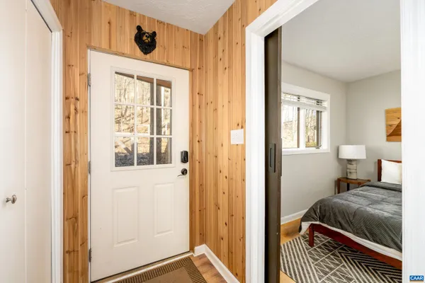 a view of a bedroom from a hallway