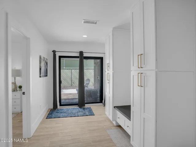 a view of gallery with windows