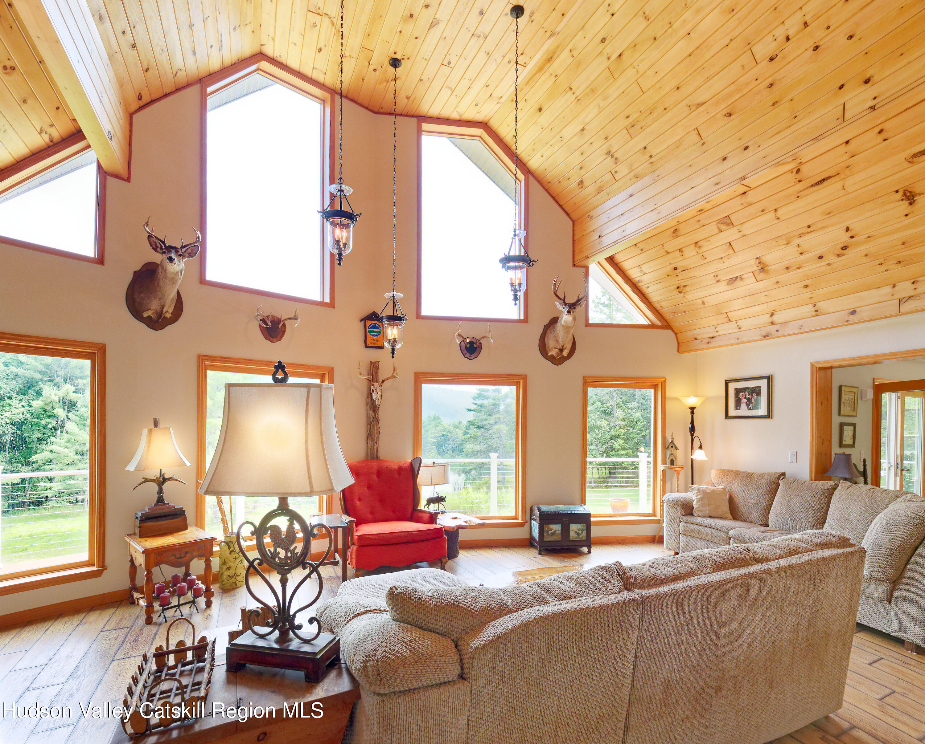 1324 Hauverville Road Middleburgh, NY 12122 - Photo 4 of 28 a living room with fireplace furniture and a large window