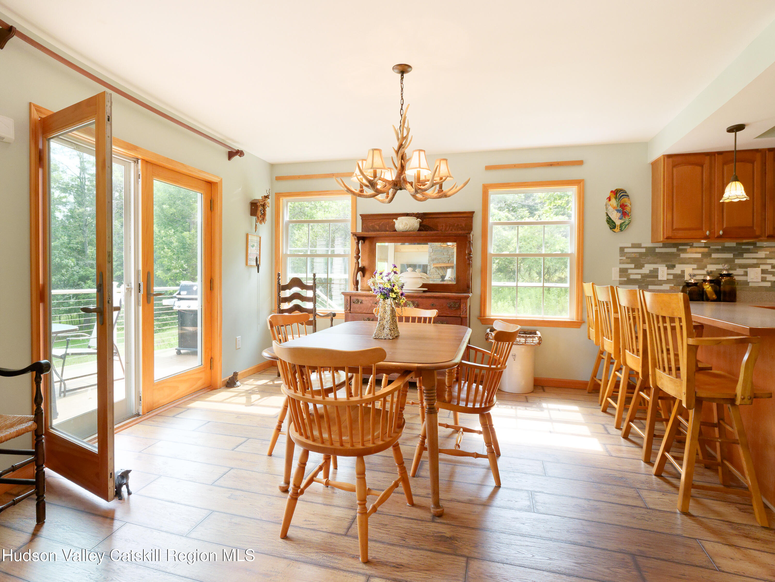 1324 Hauverville Road Middleburgh, NY 12122 - Photo 9 of 28 a view of a dining room with furniture window and wooden floor