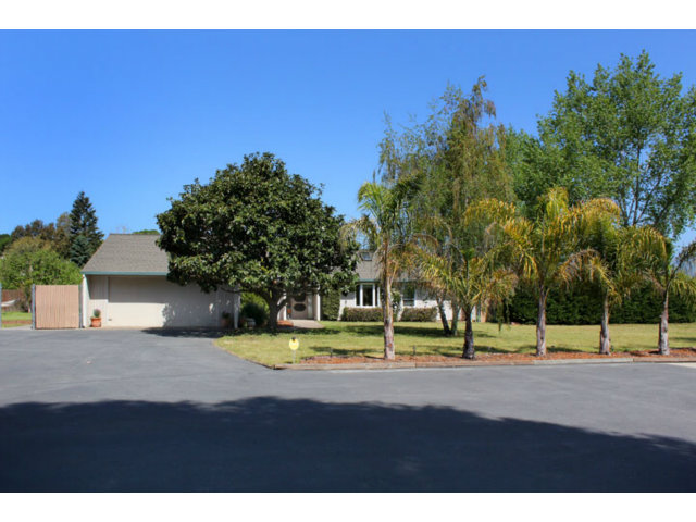 105 Corralitos Road Corralitos, CA 95076 - Photo 1 of 25 a view of a house with a big yard