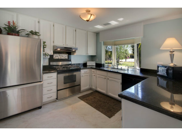 105 Corralitos Road Corralitos, CA 95076 - Photo 2 of 25 a kitchen with granite countertop a sink stainless steel appliances and cabinets