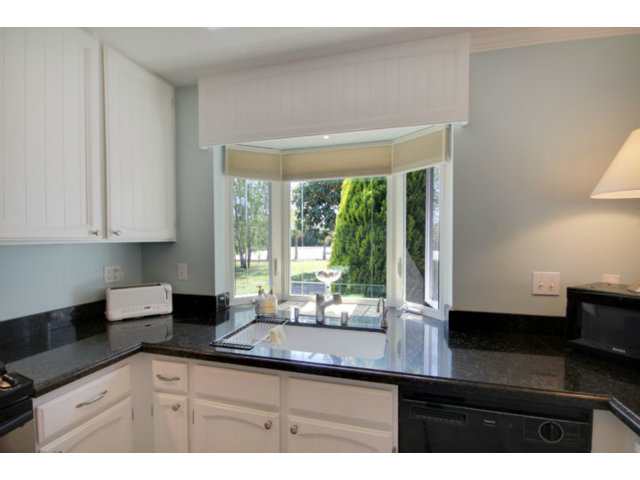 105 Corralitos Road Corralitos, CA 95076 - Photo 3 of 25 a kitchen with a sink and large window