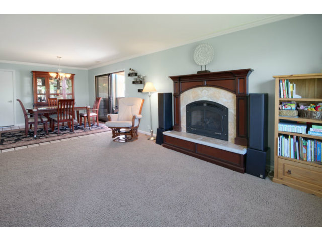 105 Corralitos Road Corralitos, CA 95076 - Photo 6 of 25 a living room with furniture and a fireplace