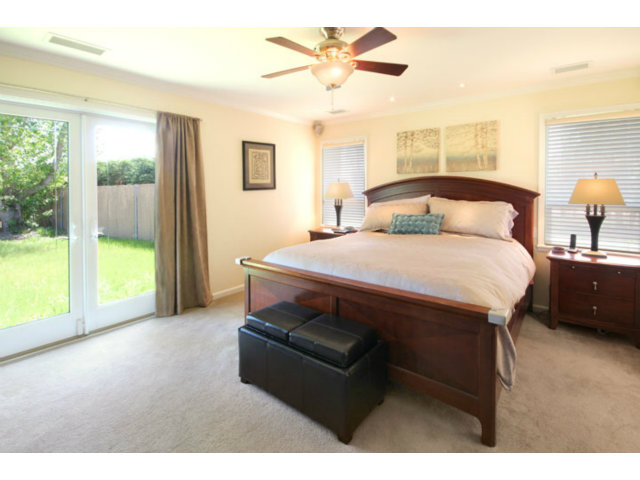 105 Corralitos Road Corralitos, CA 95076 - Photo 9 of 25 a bedroom with a bed and a night stand