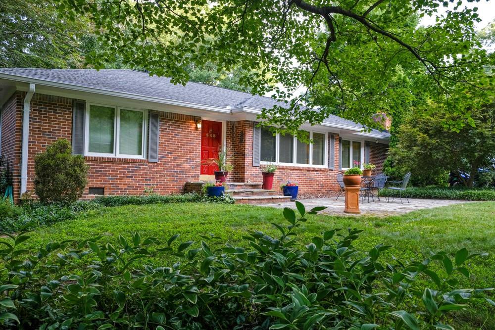 548 North Superior Avenue Decatur, GA 30033 - Photo 1 of 1 a front view of a house with a yard and porch